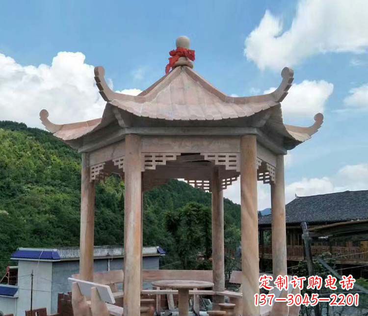 唐山一流的公园晚霞红六角石雕凉亭